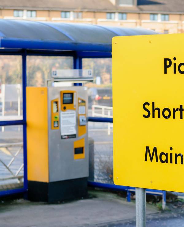 Sign to the pick up area, short stay and main stay car parks at Belfast International Airport