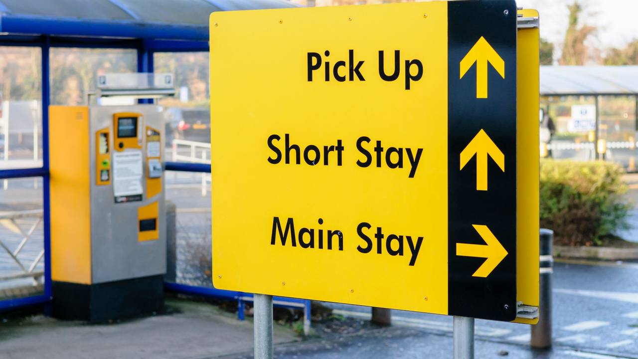 Sign to the pick up area, short stay and main stay car parks at Belfast International Airport