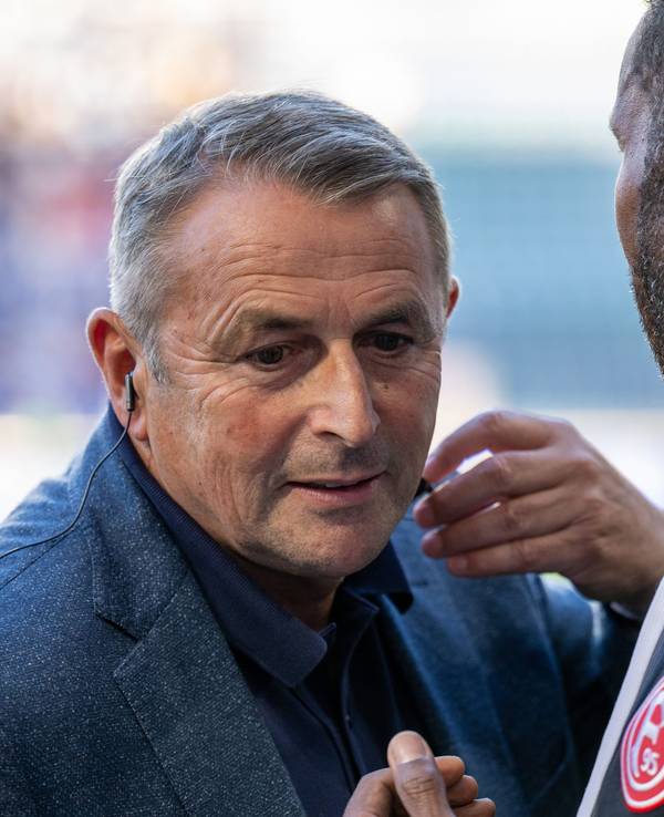 Klaus Allofs und Daniel Thioune.