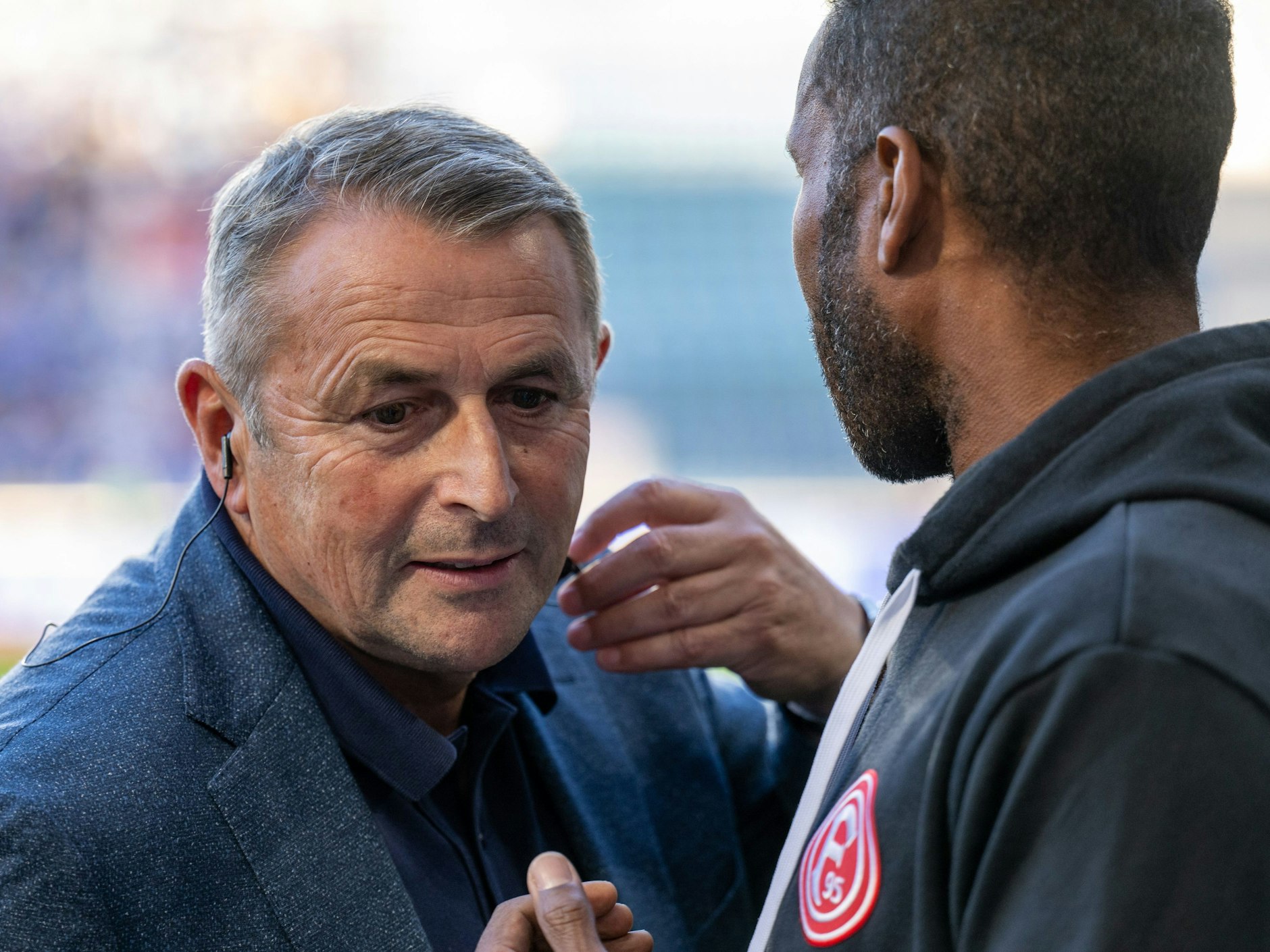 Klaus Allofs und Daniel Thioune.