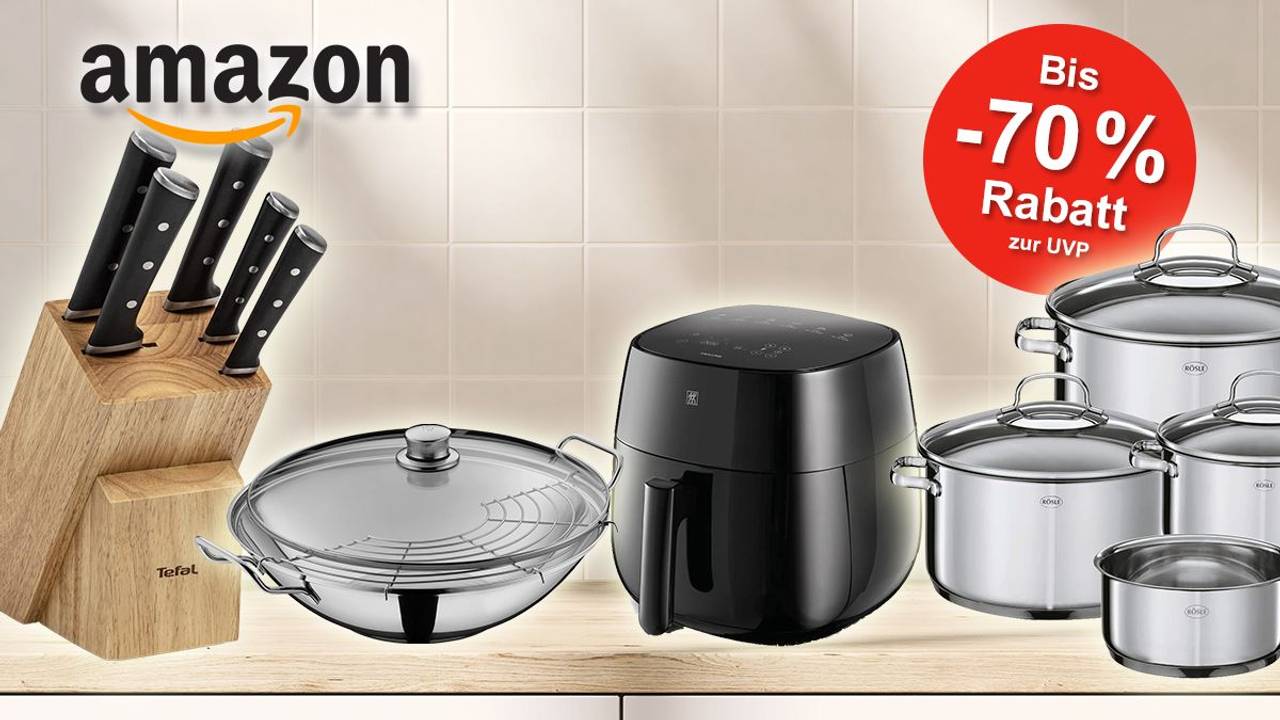 Küchenprodukte wie Wokpfanne, Airfryer, Topfset und Messerblock stehen auf einer Küchenablage