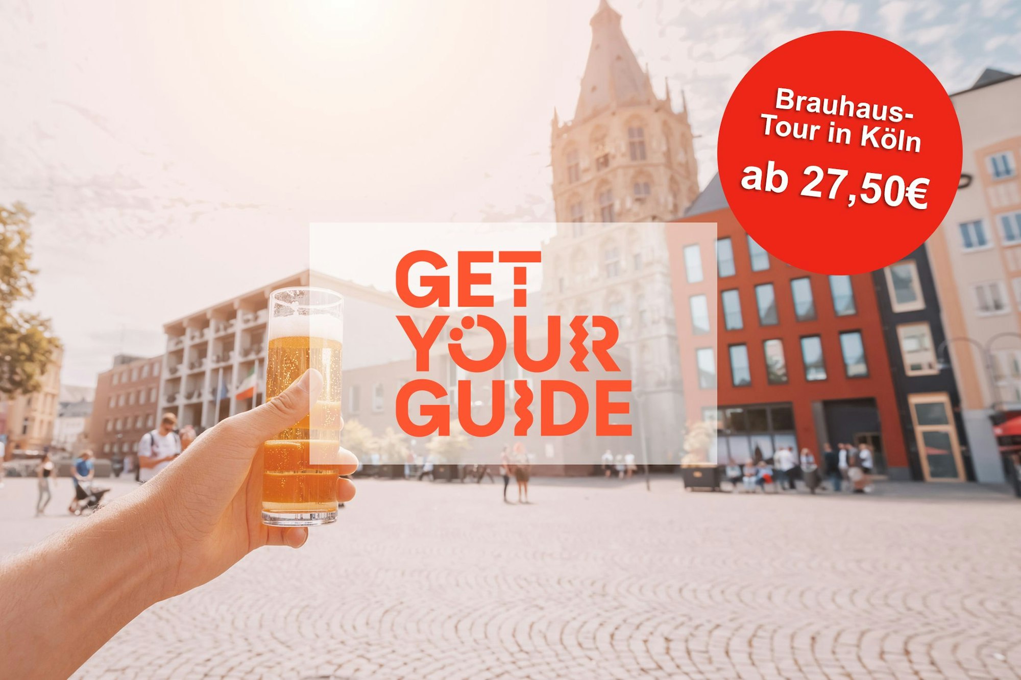 Hand with traditional Cologne koelsch beer in outdoor pub with old town square in background
