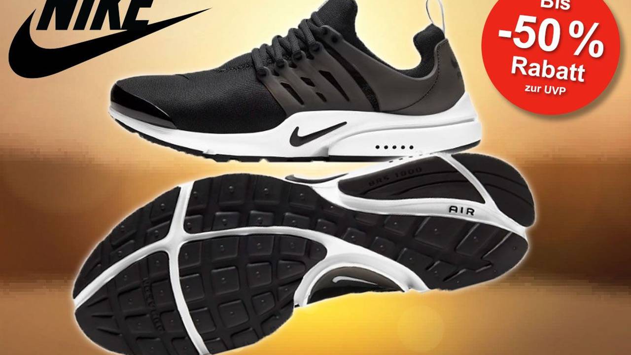 Nike Air Presto Sneaker in Farbe Schwarz-Weiß gezeigt von der Seite und von unten.