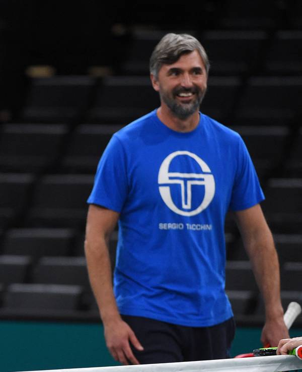 Novak Djokovic und sein Trainer Goran Ivanisevic lachen.