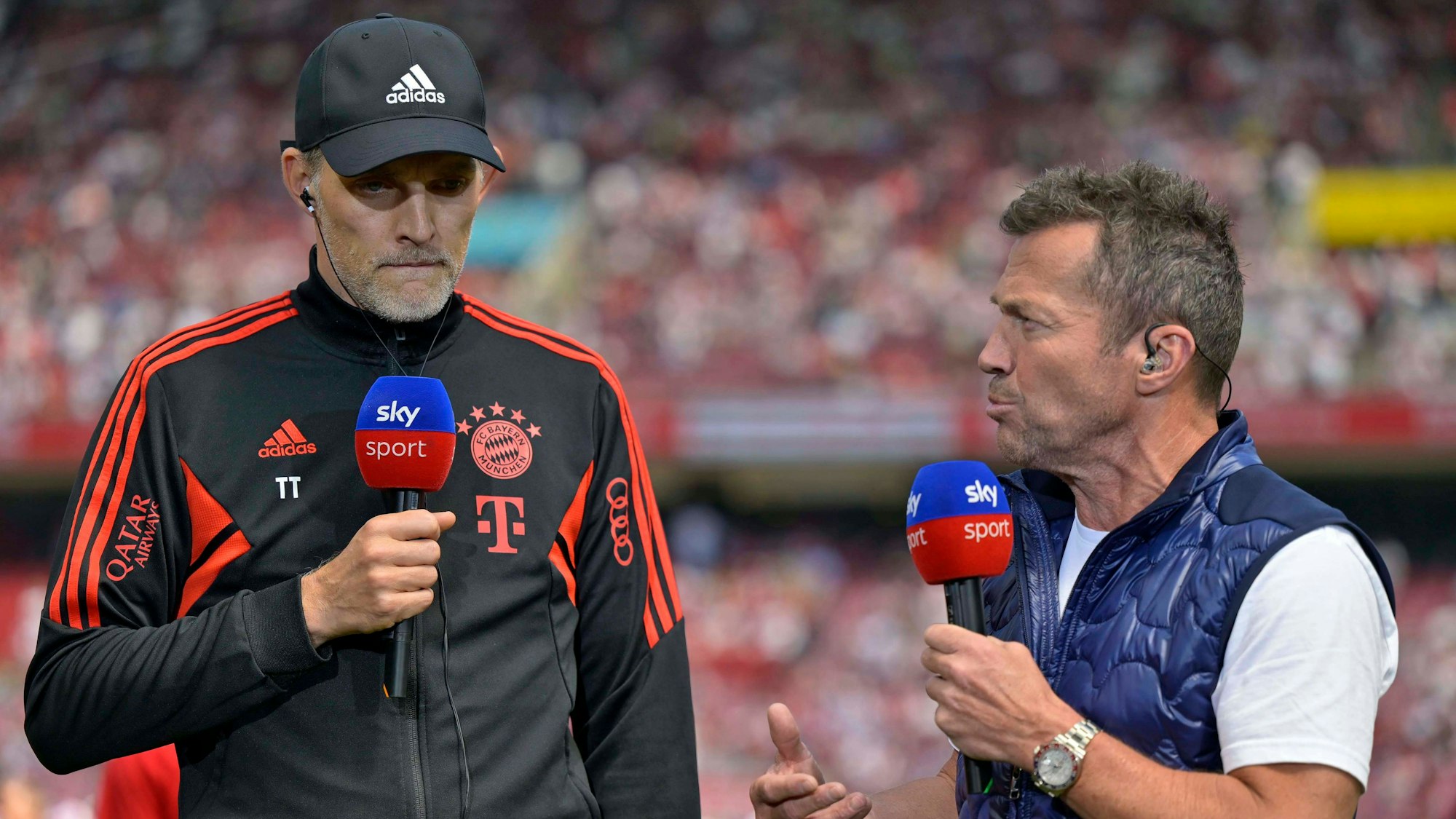Thomas Tuchel und Lothar Matthäus stehen bei einer Sky-Übertragung nebeneinander.