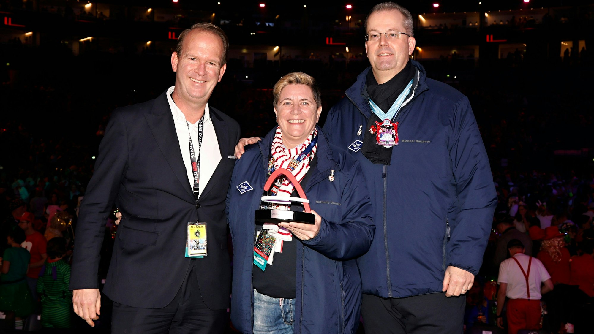 Stefan Löcher (l.) mit Nathalie Drmota und Michael Burgmer.