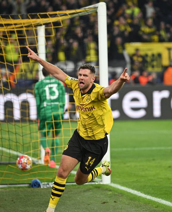 Borussia Dortmunds Niclas Füllkrug jubelt nach seinem Tor zum 3:2 gegen Atlético Madrid in der Champions League.