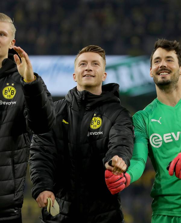 Roman Bürki (rechts) mit seinen Ex-BVB-Kollegen Marco Reus (mitte) und Erling Haaland (links)