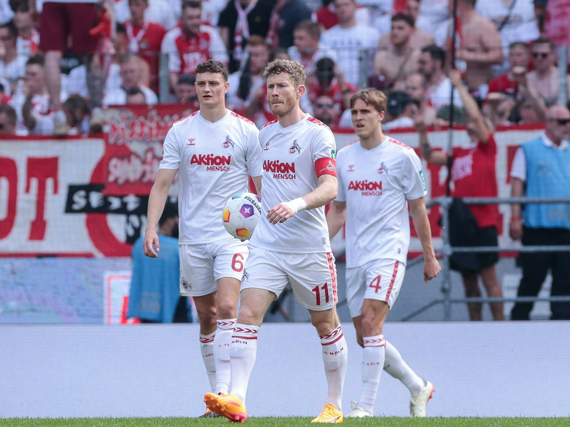 Eric Martel, Florian Kainz und Timo Hübers beim Spiel gegen Union.