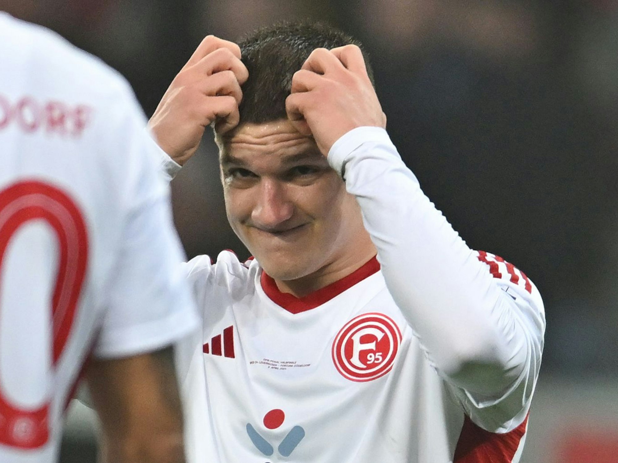 Christos Tzolis reagiert unzufrieden.