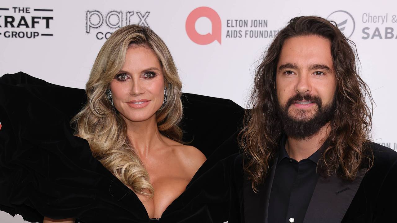 Heidi Klum und Tom Kaulitz lächeln in die Kamera.