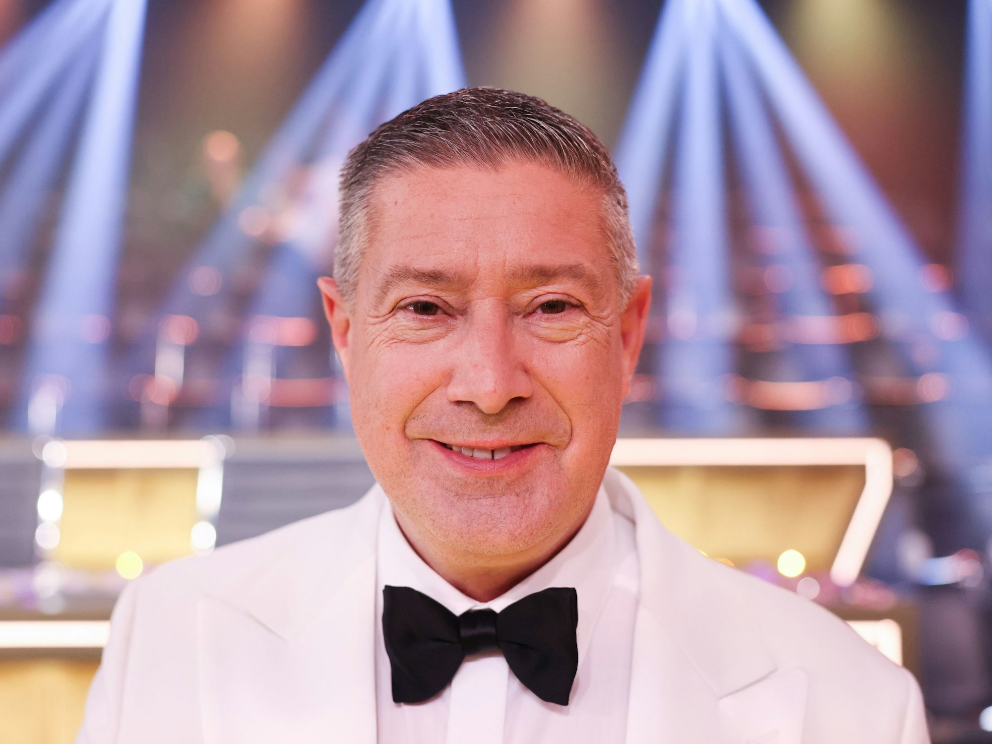 Joachim Llambi, Jurymitglied, lacht am Rande des Finales der 17. Staffel der RTL-Tanzshow „Let's Dance“ im Coloneum, hier im Mai 2014 in Köln.