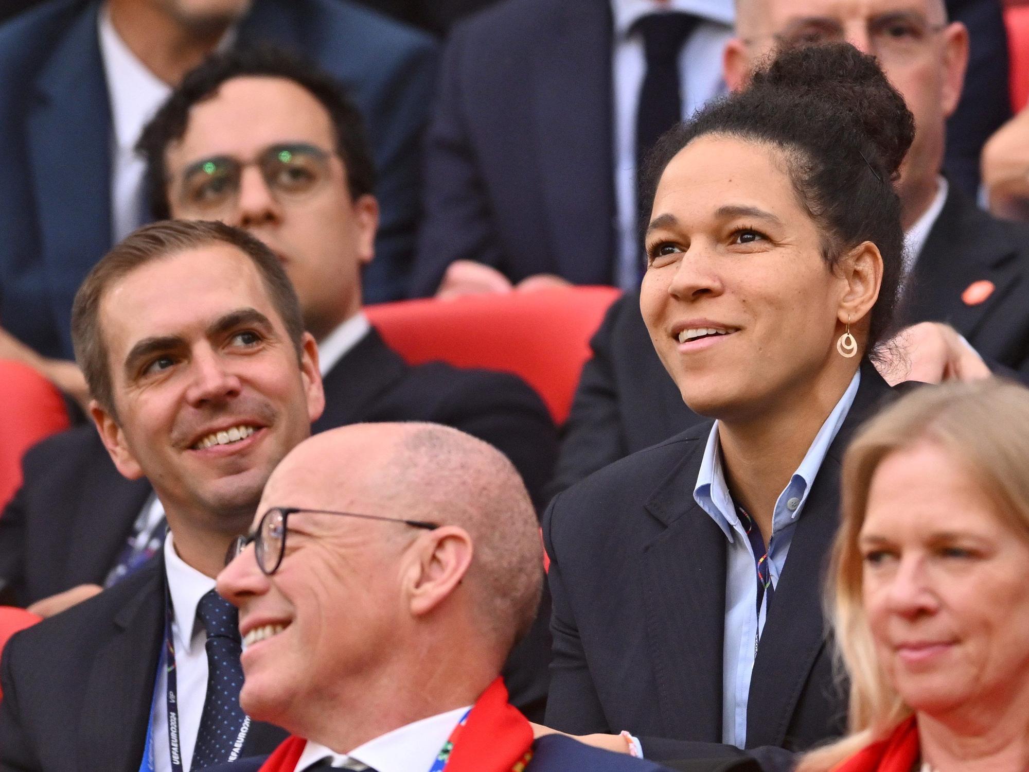 Philipp Lahm und Celia Sasic auf der Tribüne.