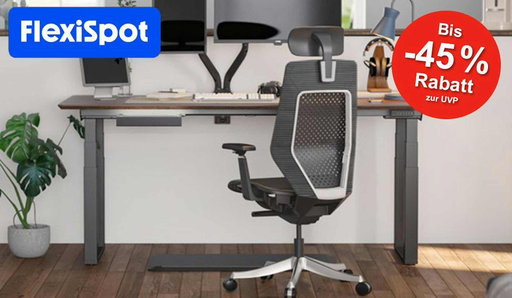 In einem Büro steht ein höhenverstellbarer Schreibtisch mit Bürostuhl von FlexiSpot.