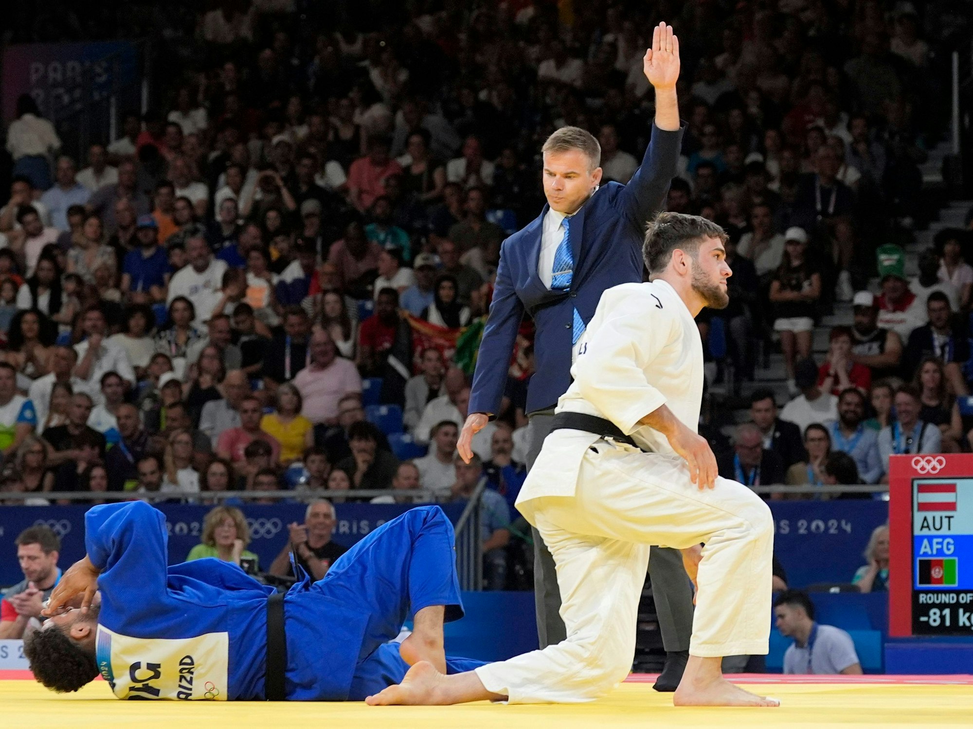 Wachid Borchashvili aus Österreich siegte bei den Olympischen Spielen gegen den Afghanen Mohammad Samim Faizad.