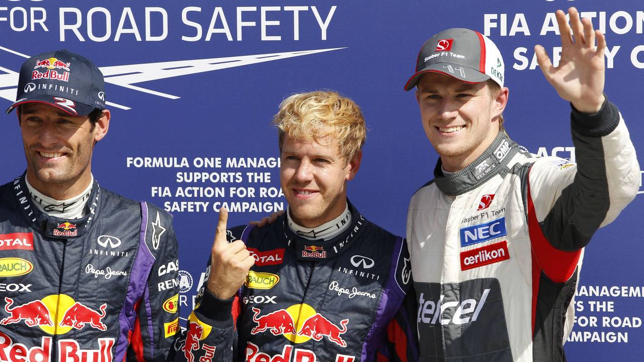 Mark Webber, Sebastian Vettel und Nico Hülkenberg posieren für ein Foto.