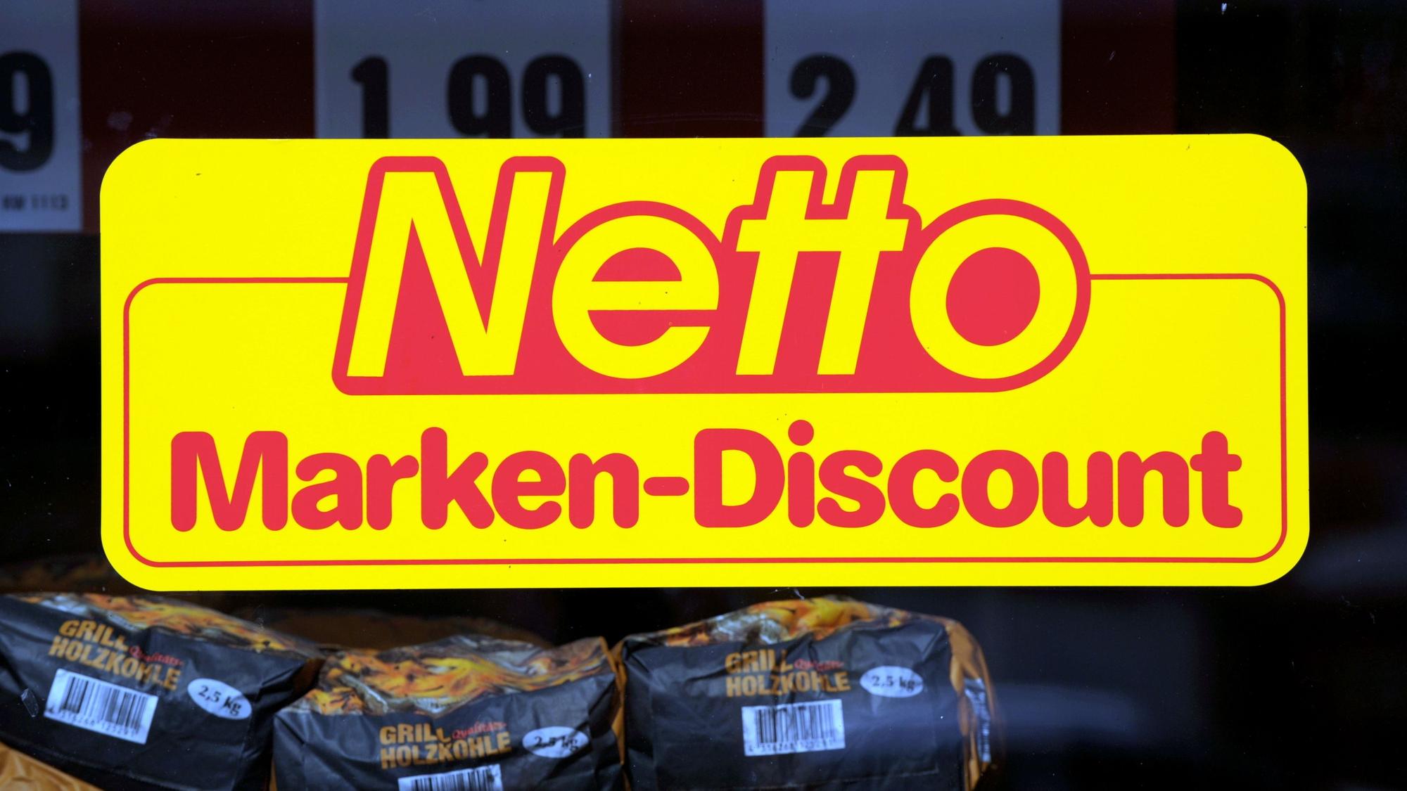 Netto Logo mit Grillkohle