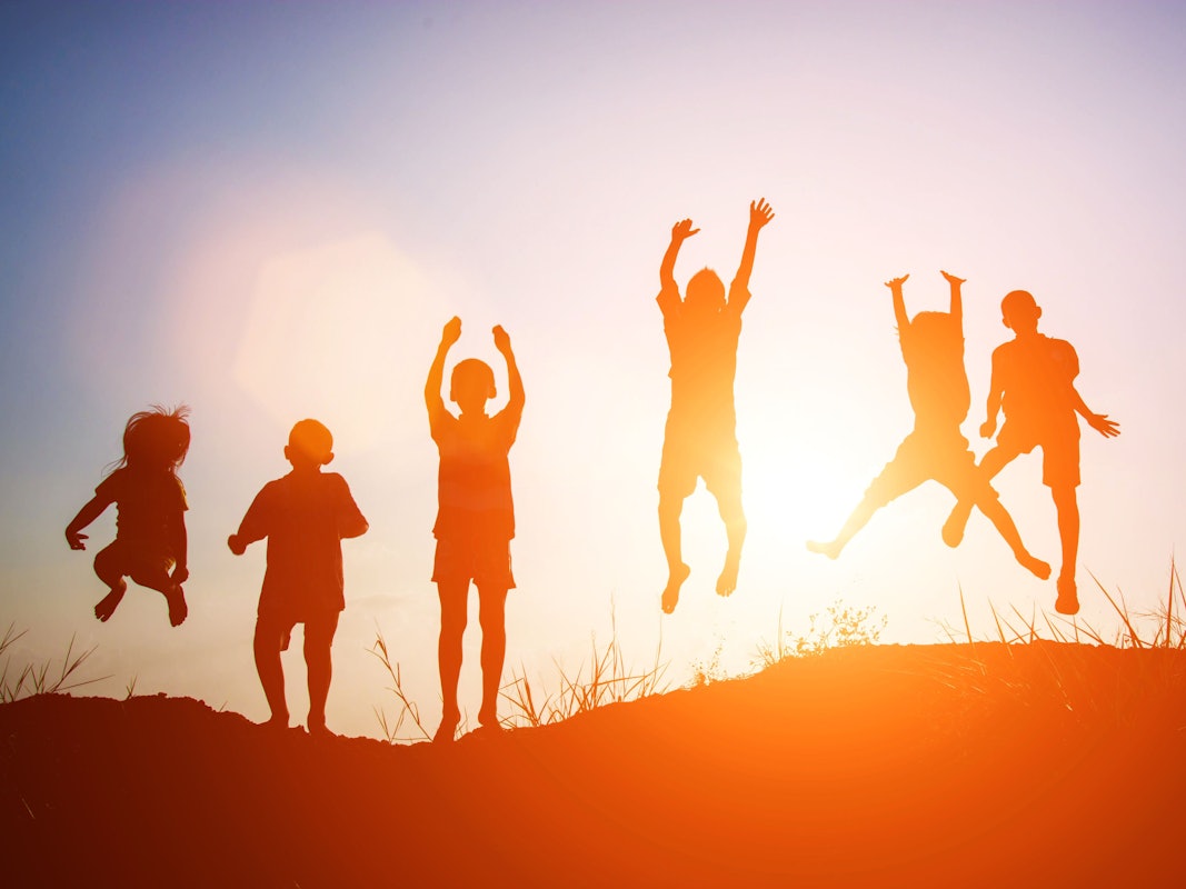 Silhouette of children jump gladness happy time