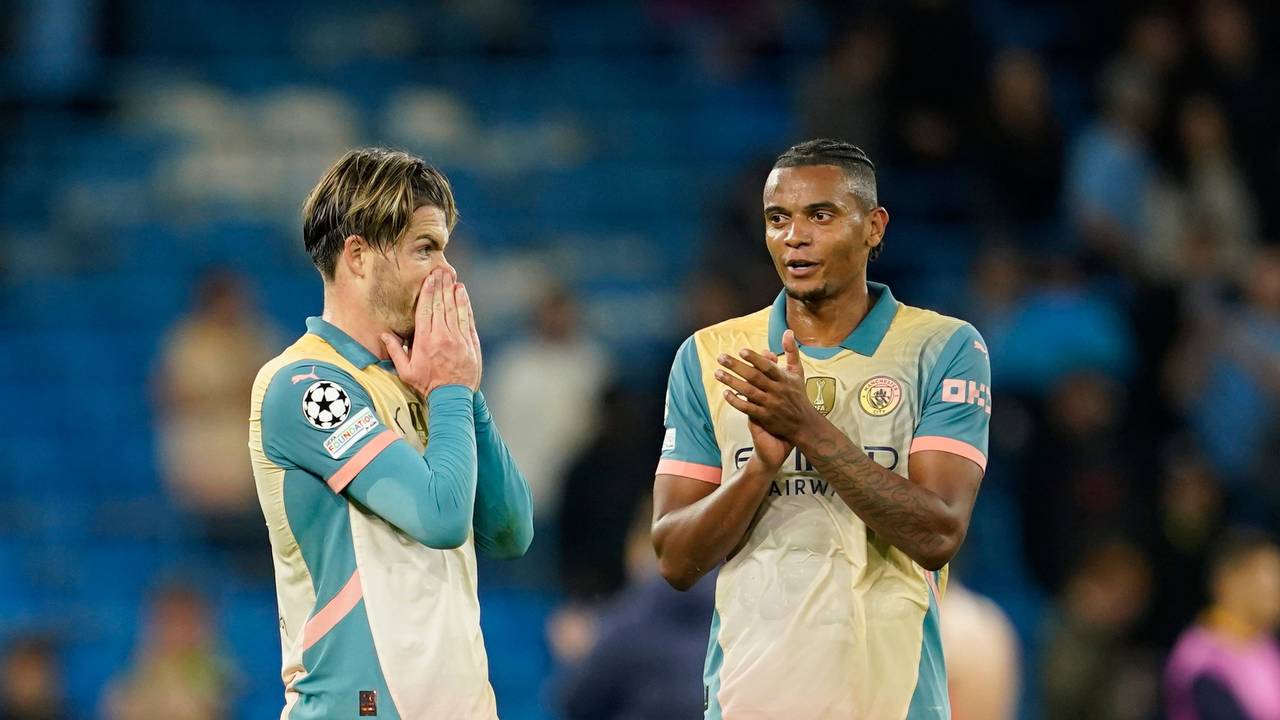 Jack Grealish und Manuel Akanji reagieren nach dem Spiel.
