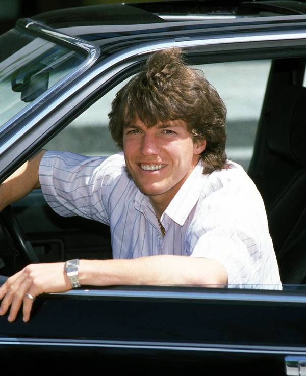 Lothar Matthäus posiert in einem BMW.