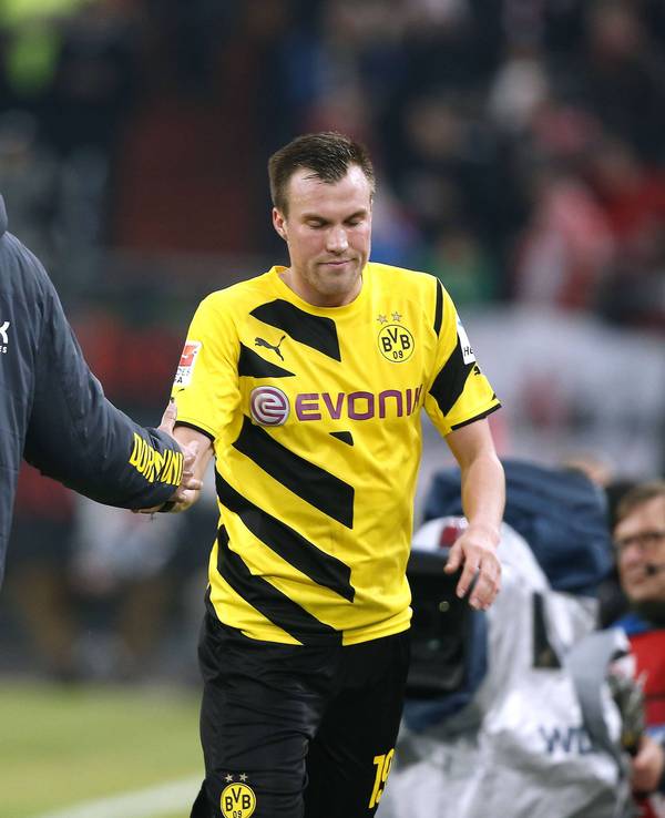 Jürgen Klopp und Kevin Großkreutz schlagen bei einem Wechsel ein.