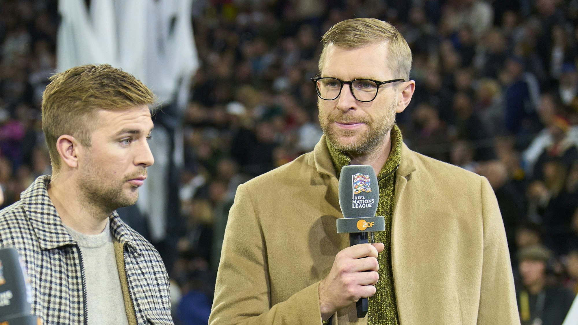 Per Mertesacker (r.) und Christoph Kramer am 14. Oktober 2024 als ZDF-Experten beim Deutschland-Spiel in der Nations League.