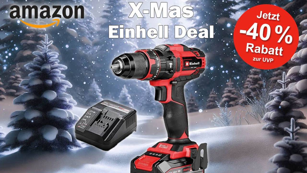 Einhell Akku-Schlagbohrschrauber TE-CD 18/44 Li-i mit Ladegerät vor einem verschneiten Winterwald.