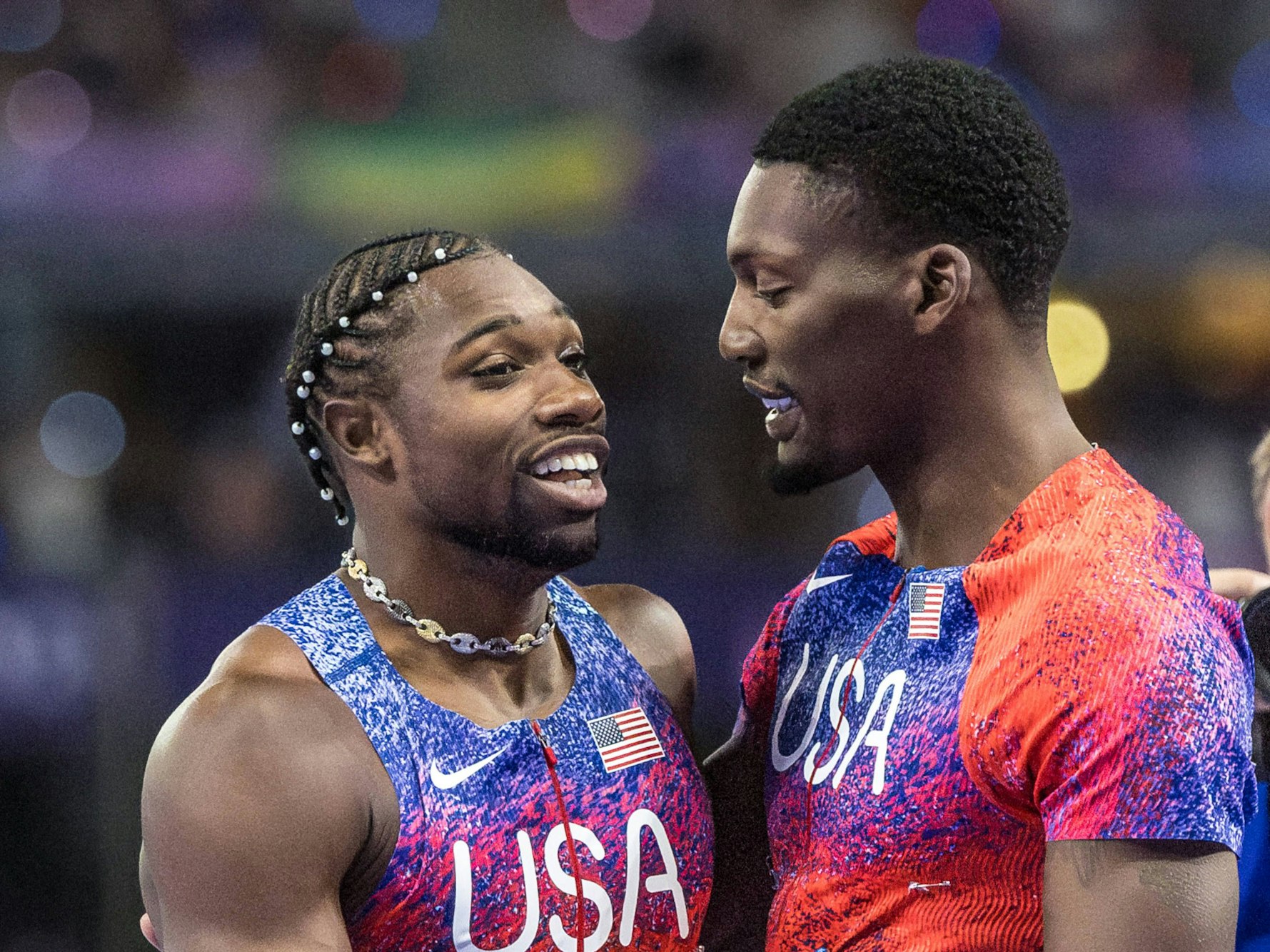Noah Lyles und Fred Kerley nach dem 100m-Finale bei den Olympischen Spielen.