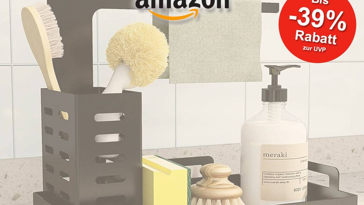 Auf dem Bild ist ein Küchenorganizer mit Seife, Schwamm, Bürste und Lappen zu sehen