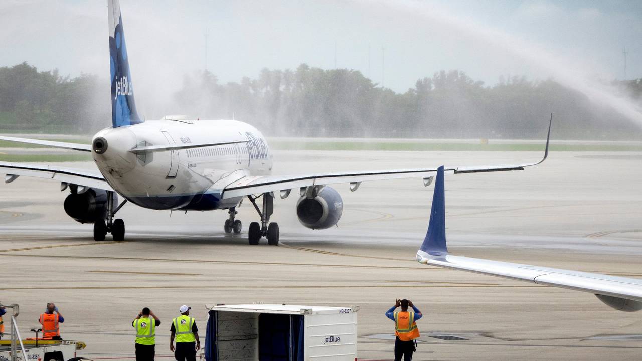 The first regularly scheduled flight to Cuba taxies under the firefighter's spray on the tarmac at Fort Lauderdale International Airport in Florida, USA, 31 August 2016.