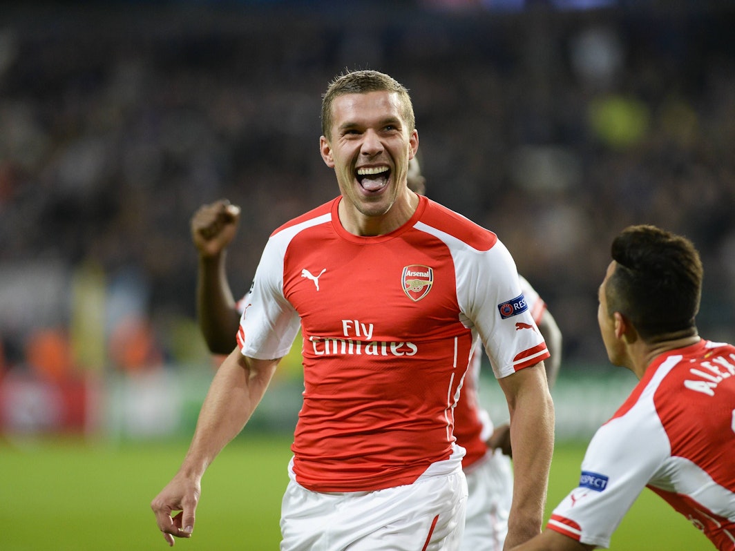 Lukas Podolski jubelt im Trikot des FC Arsenal.
