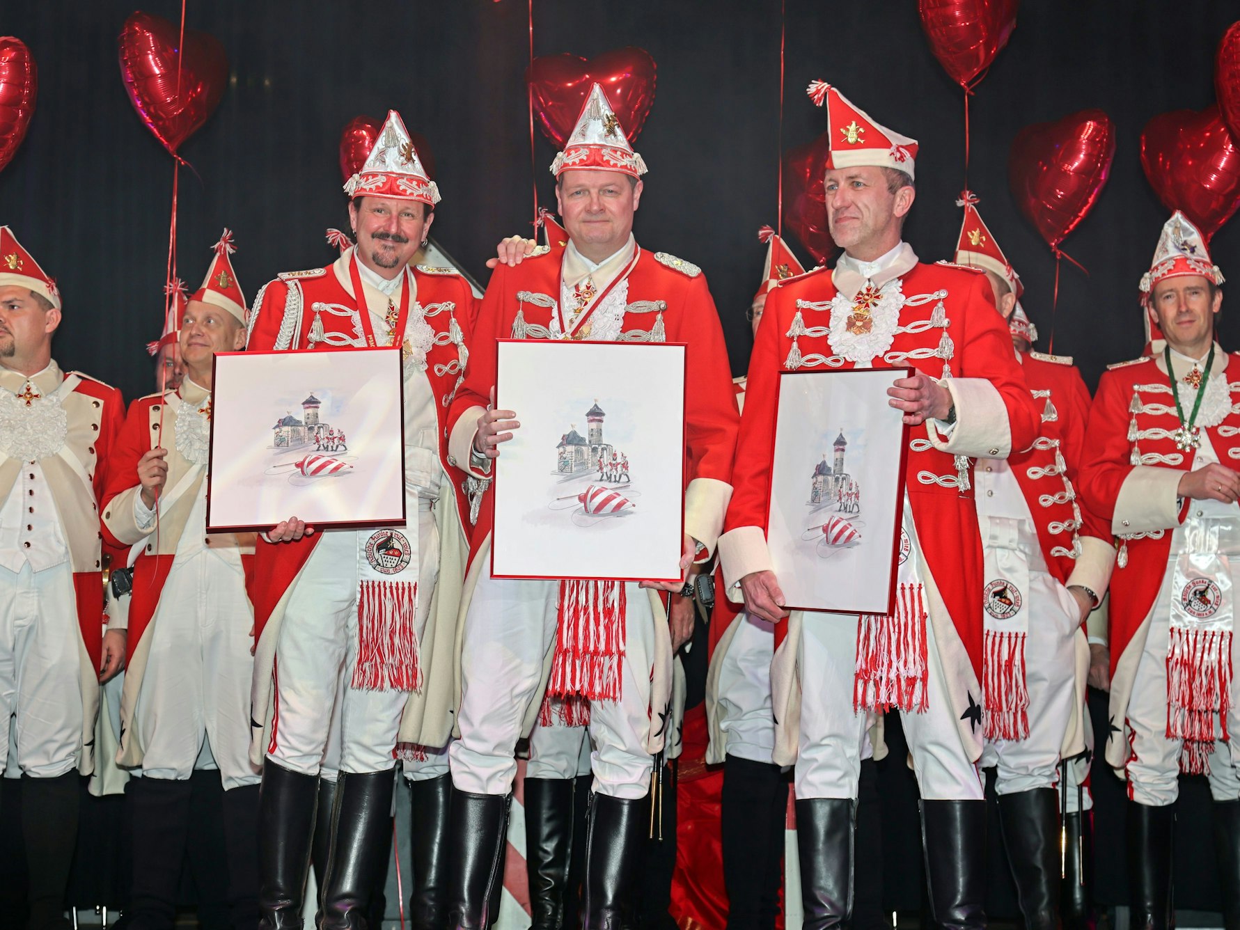 Boris Müller (M.), Marco Schneefeld (l.) und André Fahnenbruck von den Rote Funken.