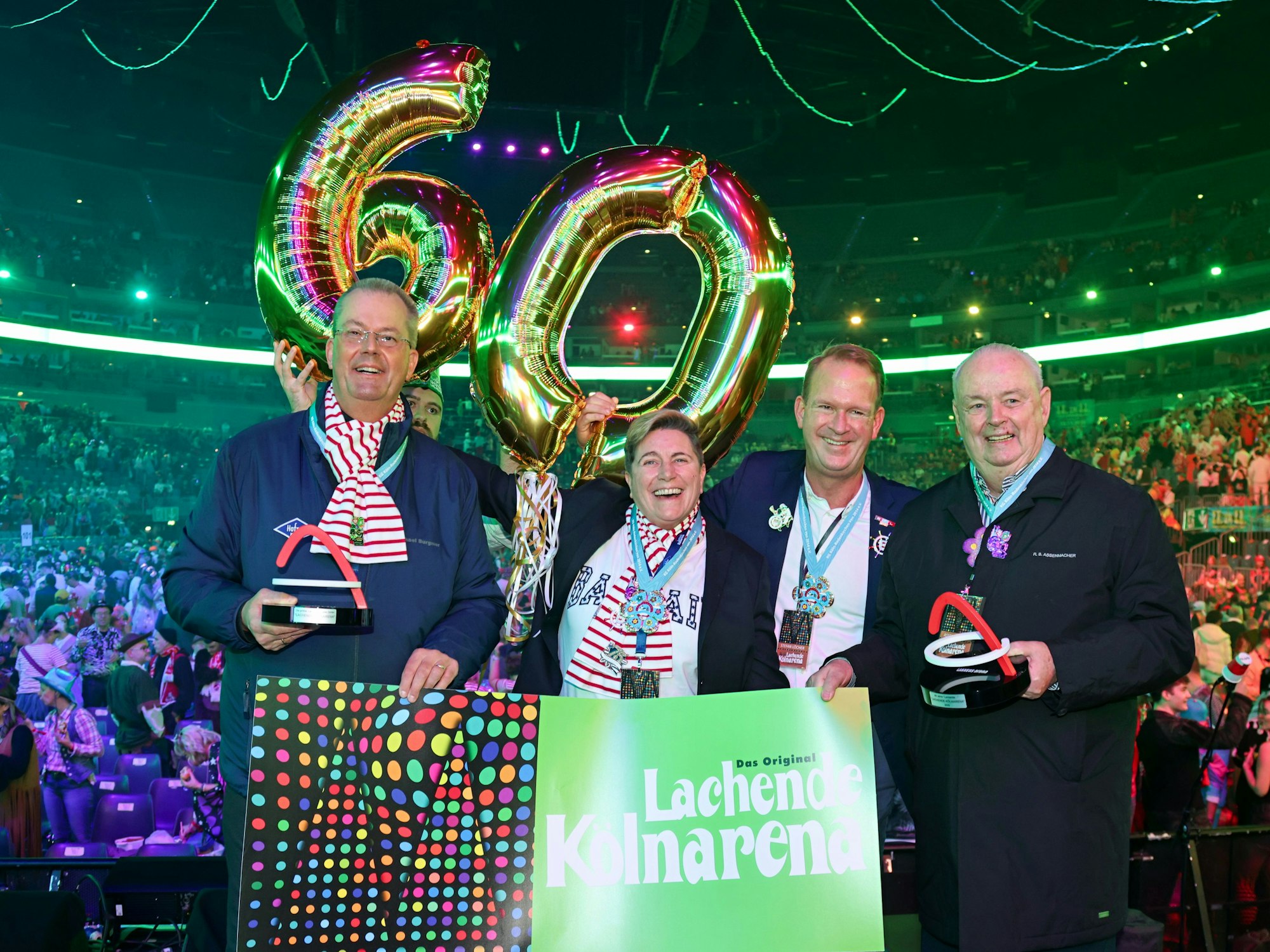 Michael Burgmer, Nathalie Drmota, Stefan Löcher und Ralf Bernd Assenmacher auf der Bühne.
