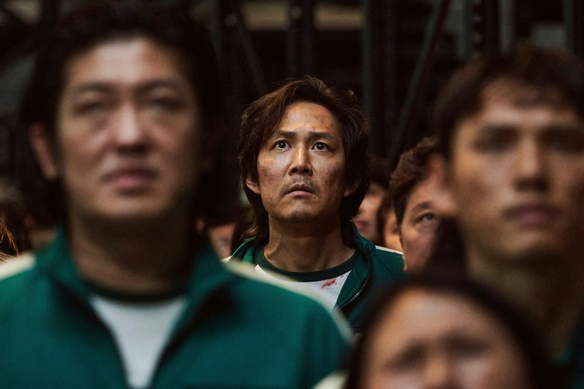 Dieses von Netflix veröffentlichte Videostandbild aus einer Szene der südkoreanischen Serie „Squid Game“ zeigt Lee Jung-jae (M), südkoreanischer Schauspieler, in seiner Rolle als Seong Gi-hun.