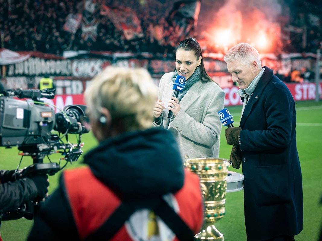 Bastian Schweinsteiger und Esther Sedlaczek vor dem Pokalspiel.