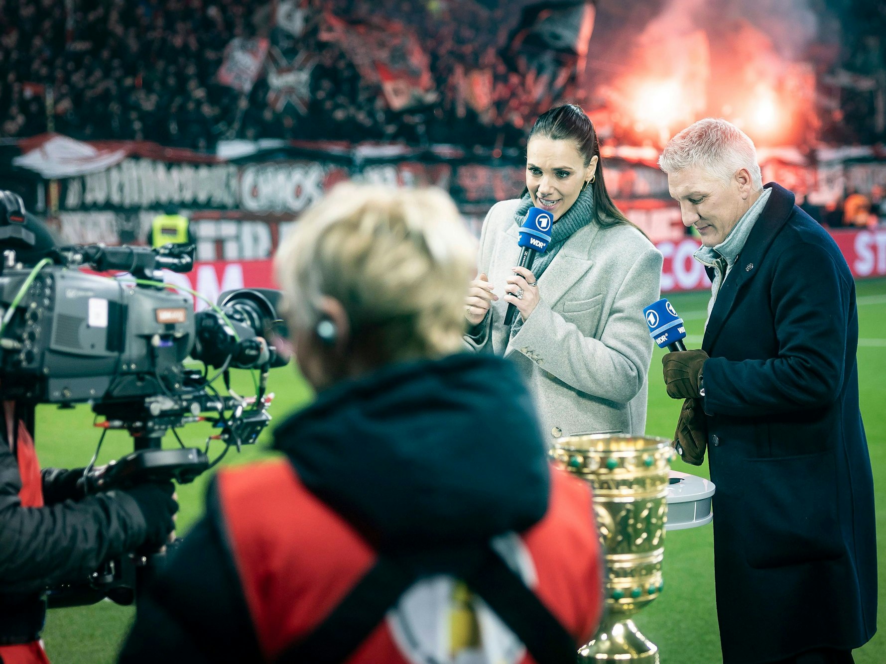 Bastian Schweinsteiger und Esther Sedlaczek vor dem Pokalspiel.