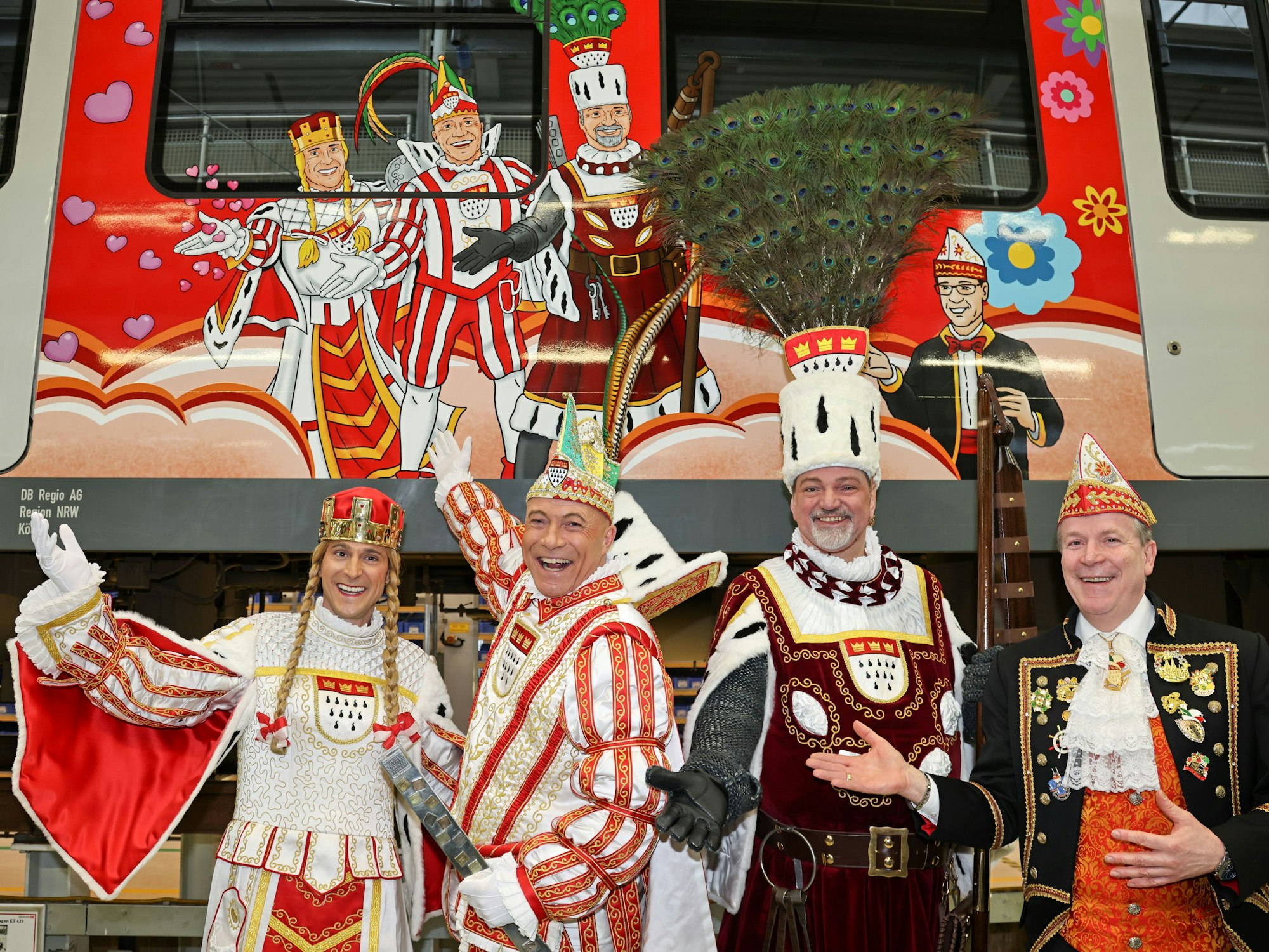 Christoph Kuckelkorn mit Prinz René, Bauer Michael und Jungfrau Marlis vor dem Karnevalszug.