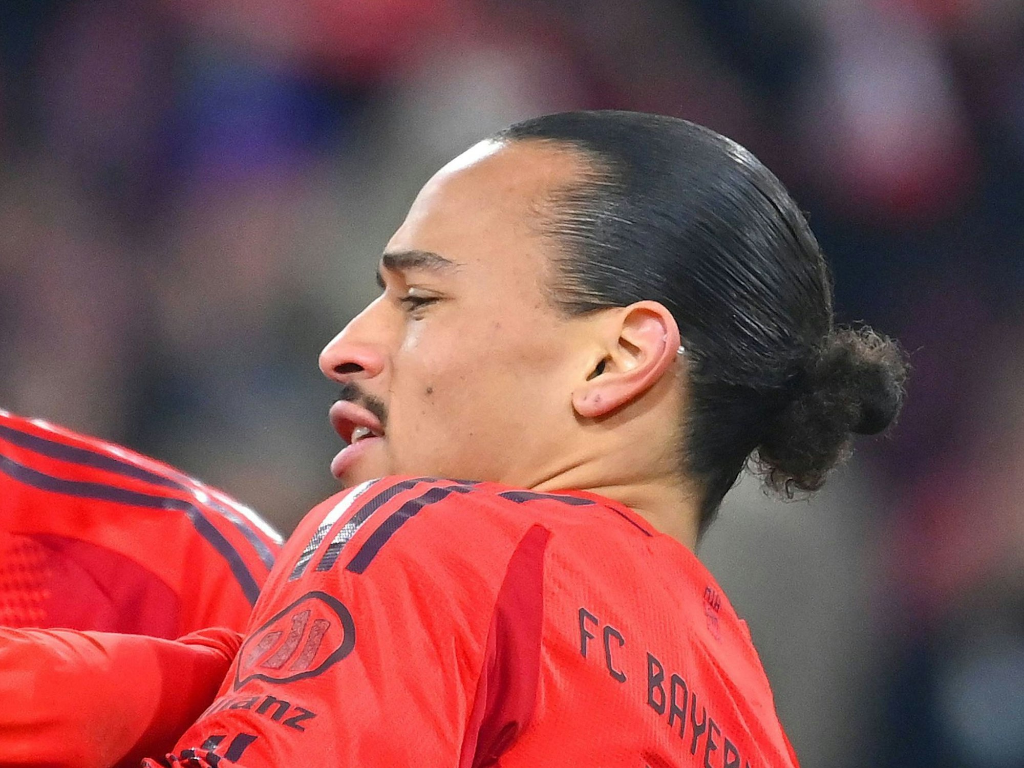 Leroy Sane, Harry Kane und Jamal Musiala jubeln.