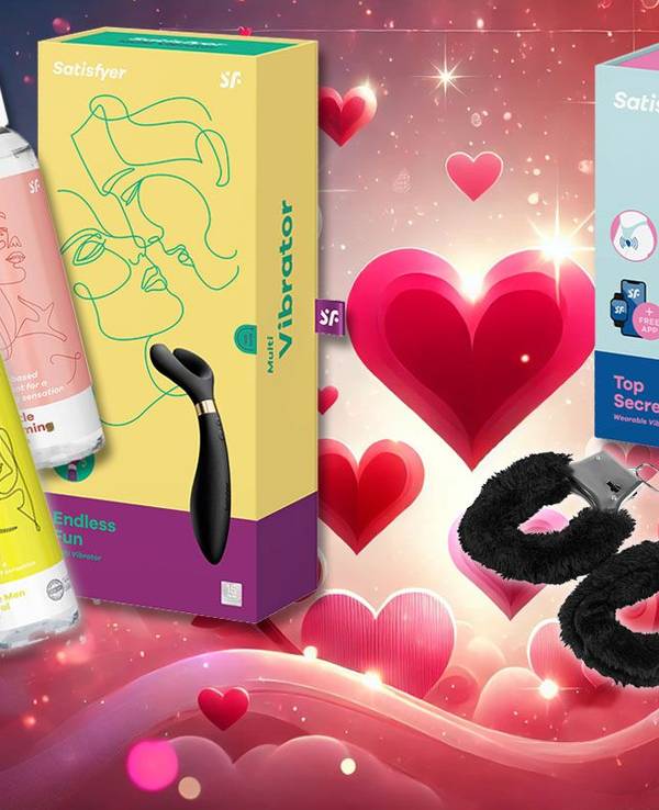 Zum Valentinstag Satisfyer Vibratoren und Toys und Massage-Gels vor einem Hintergrund mit vielen roten Herzen.