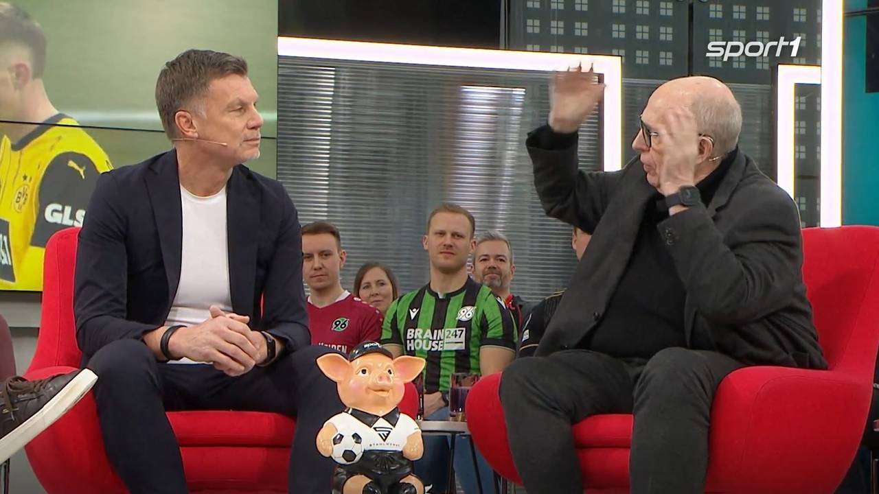 Reiner Calmund diskutiert mit Thomas Helmer.