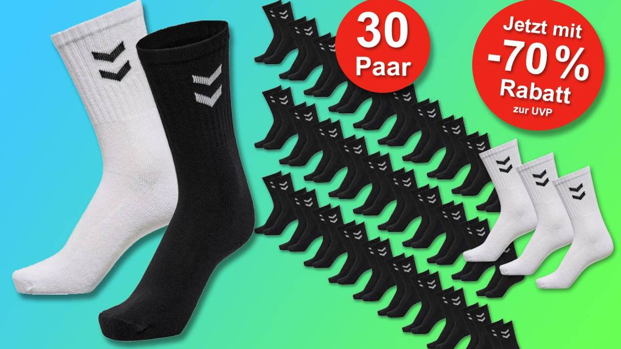 30 Paar Hummel Socken in Schwarz nebeneinander, daneben etwas größer Hummel Socken in Schwarz und Weiß vor grün blauem Hintergrund.