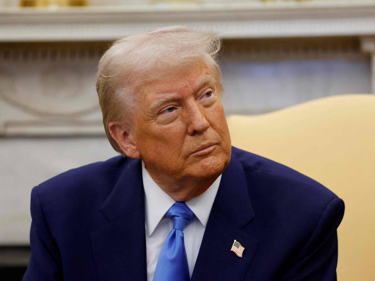 US President Donald Trump meets with French President Emmanuel Macron (out of frame) in the Oval Office of the White House in Washington, DC, on February 24, 2025. (Photo by Ludovic MARIN / POOL / AFP)
