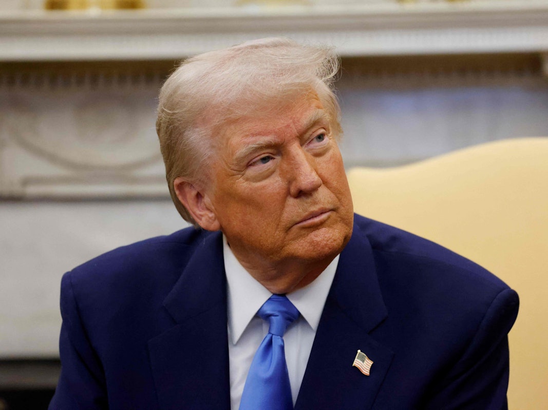 US President Donald Trump meets with French President Emmanuel Macron (out of frame) in the Oval Office of the White House in Washington, DC, on February 24, 2025. (Photo by Ludovic MARIN / POOL / AFP)