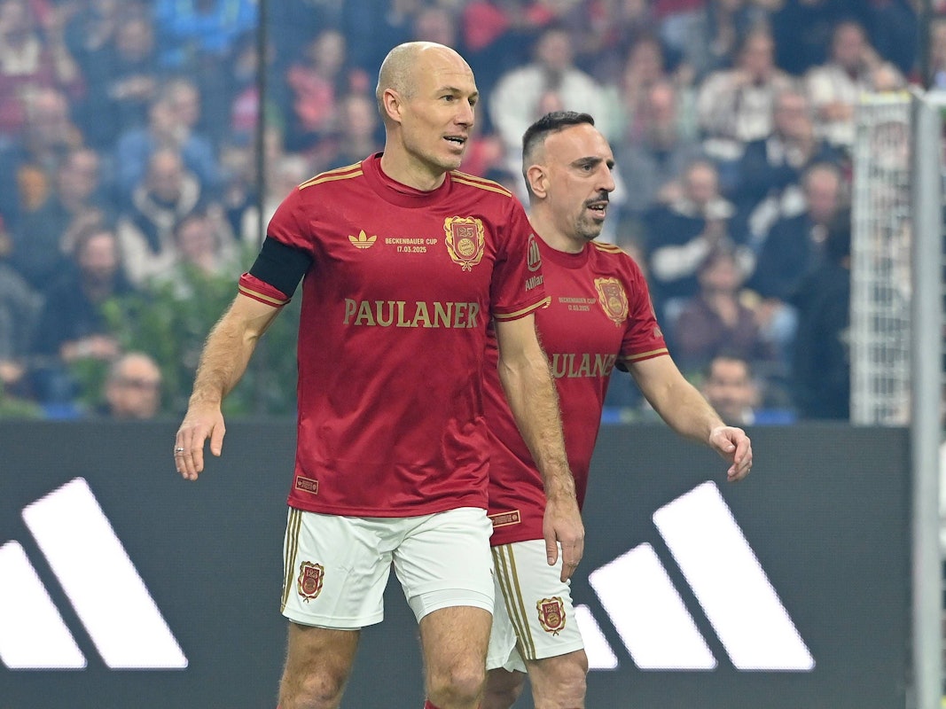 Arjen Robben (l.) und Franck Ribery mit guter Laune auf dem Platz.