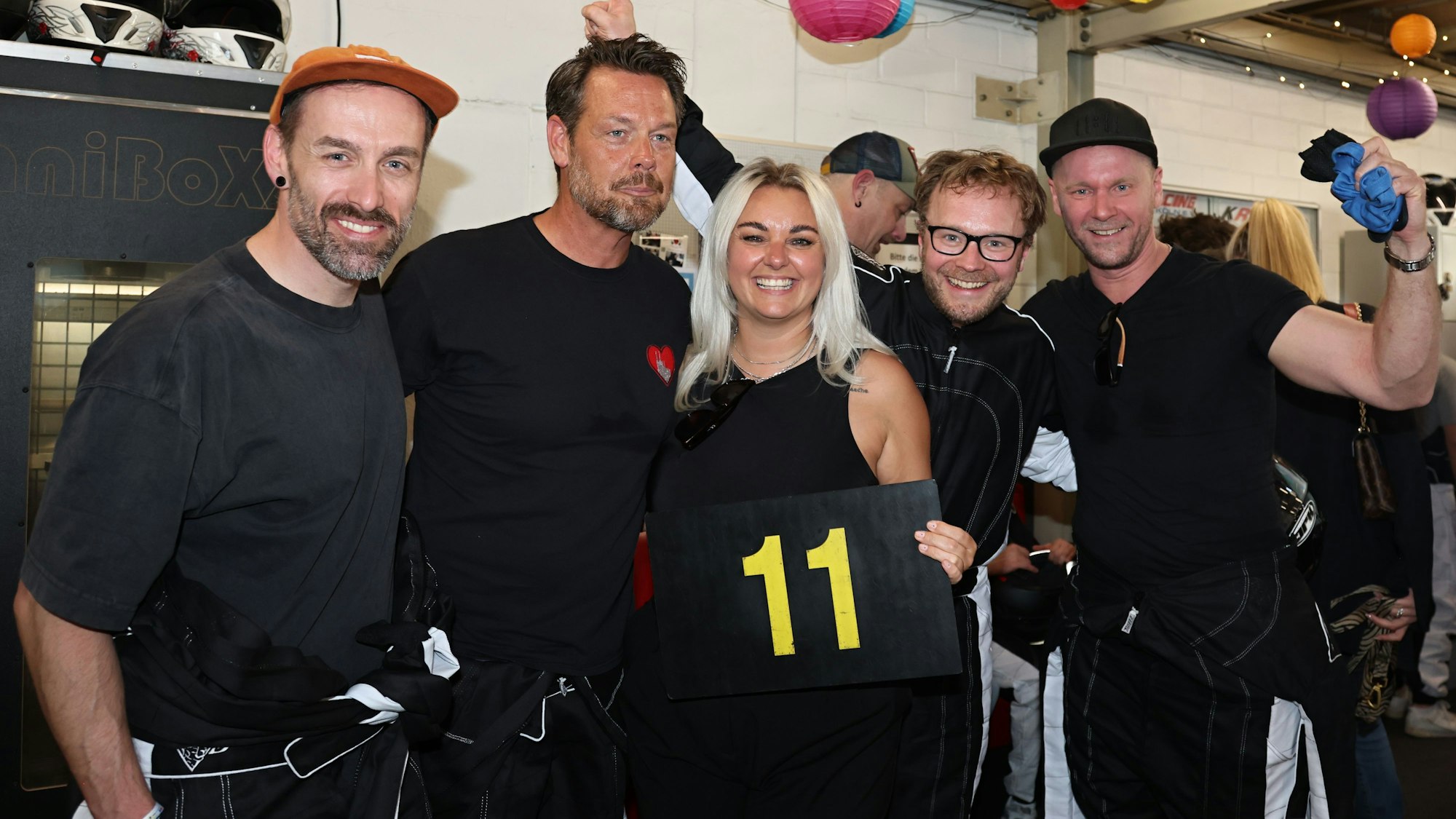 Die Fahrer der kölschen Musiker mit Coach Nici Kempermann.