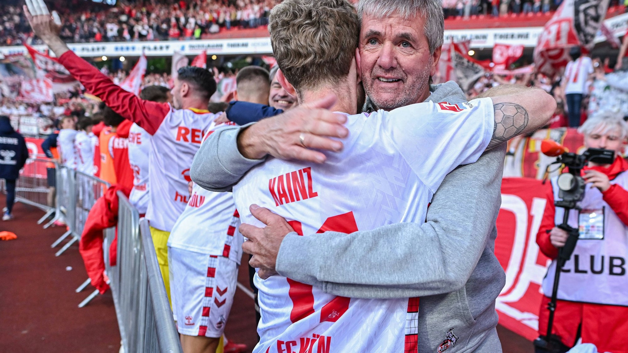 Florian Kainz und Trainer Friedhelm Funkel