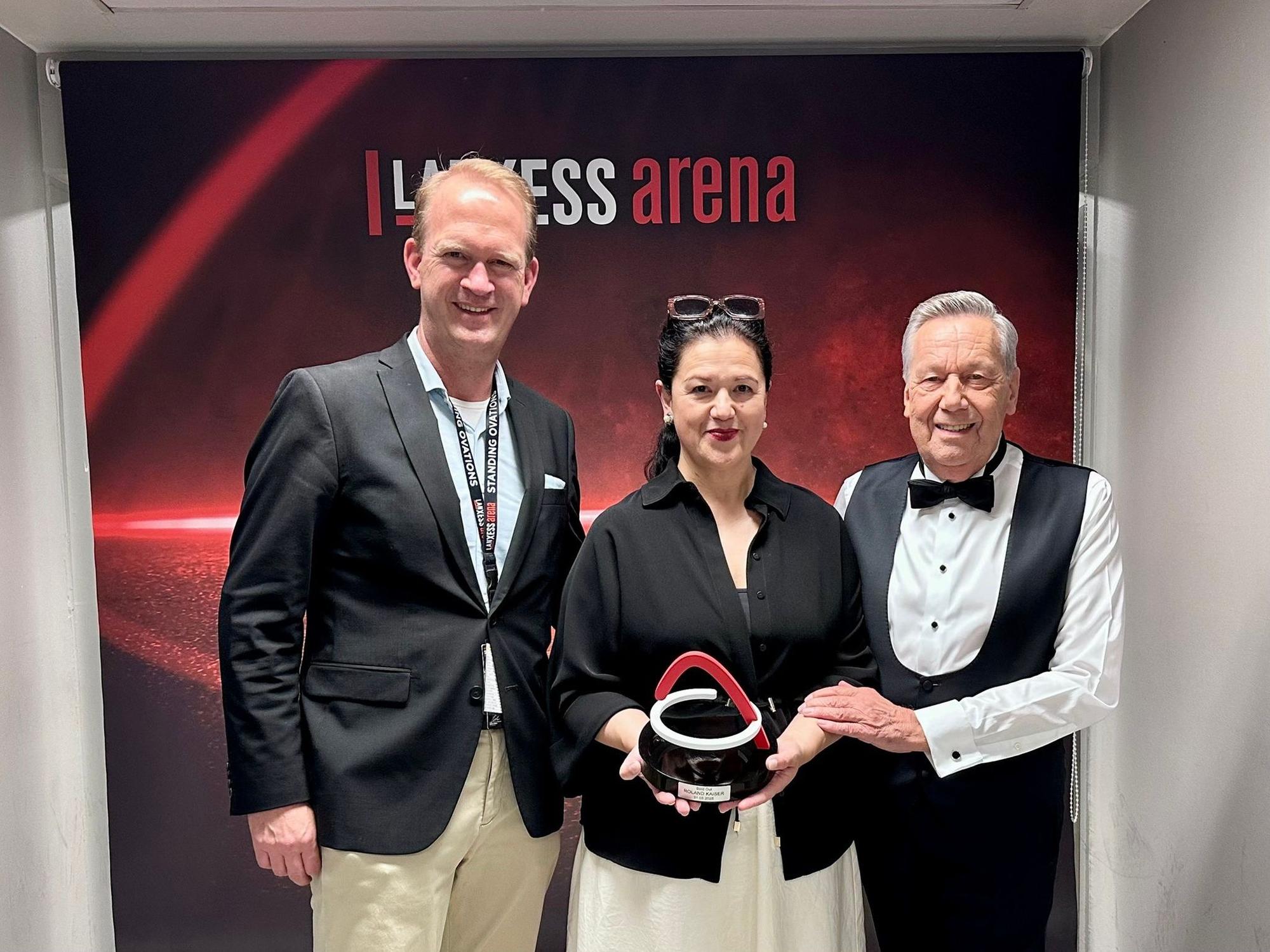 Stefan Löcher mit Viviane Kube und Roland Kaiser.