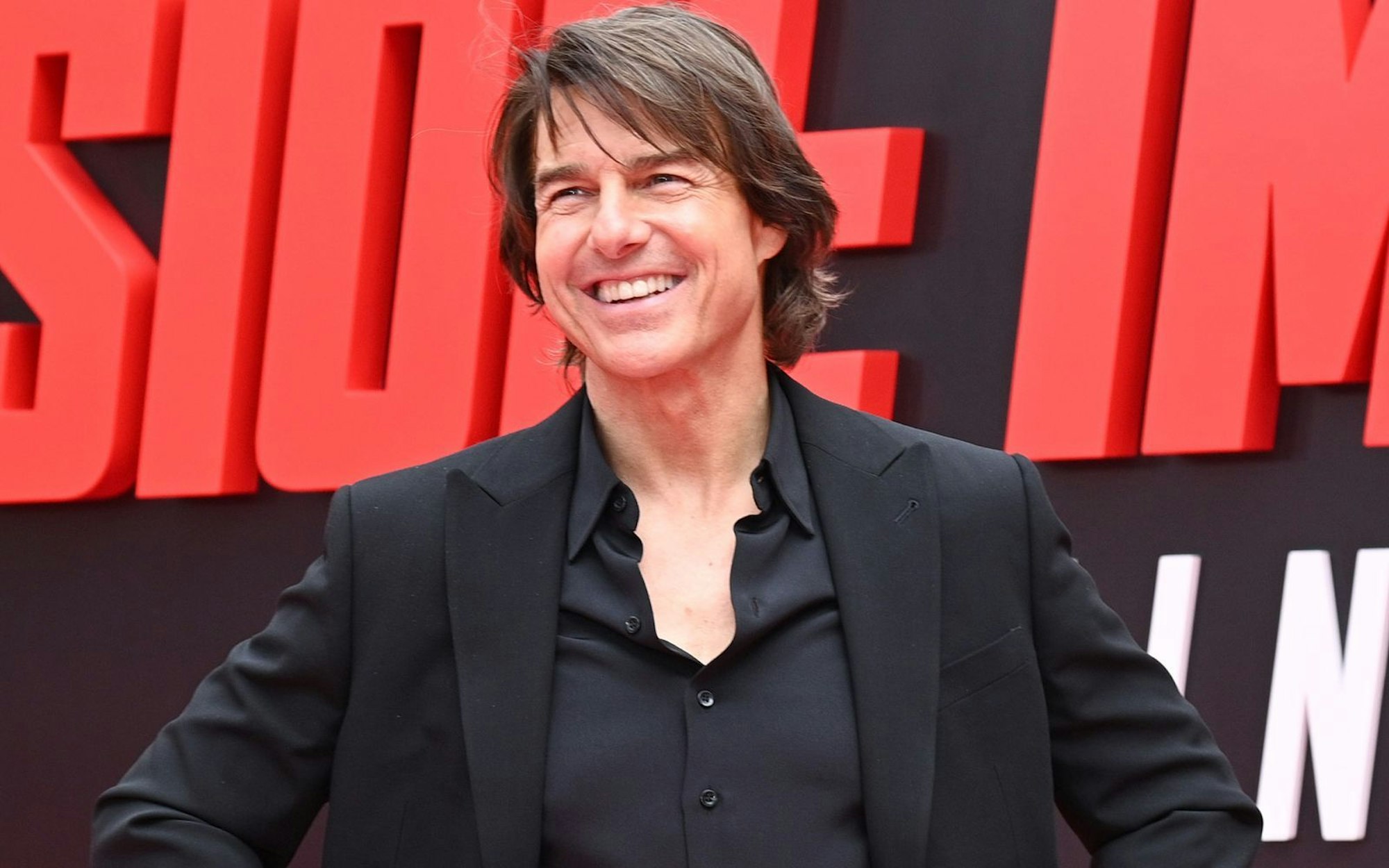 Grund zur Freude für Tom Cruise: Mit einem seiner Stunts schaffte es der Schauspieler jetzt ins „Guinness-Buch der Rekorde“. (Bild: Bryan Bedder/Getty Images for Paramount Pictures)