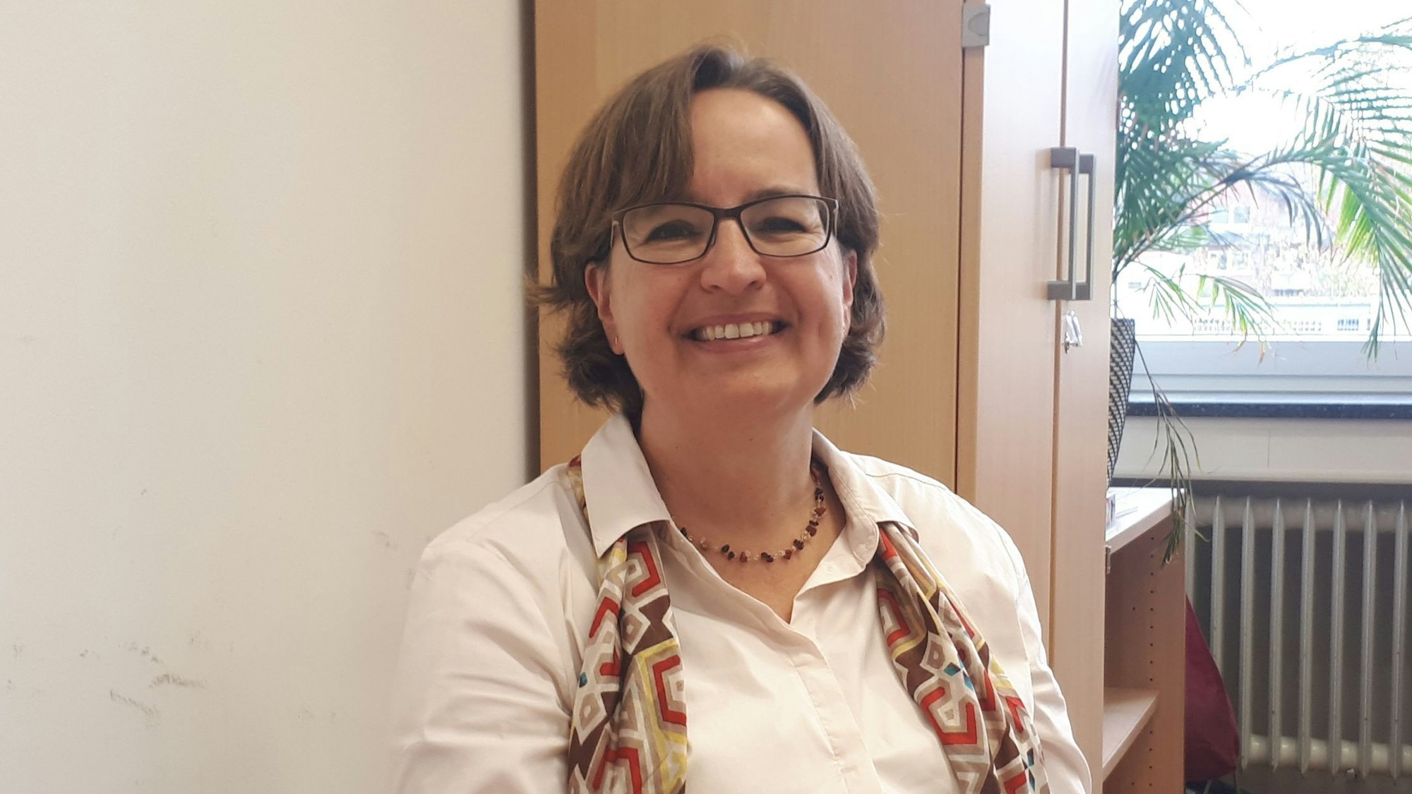 Christiane Hartmann lächelt in die Kamera