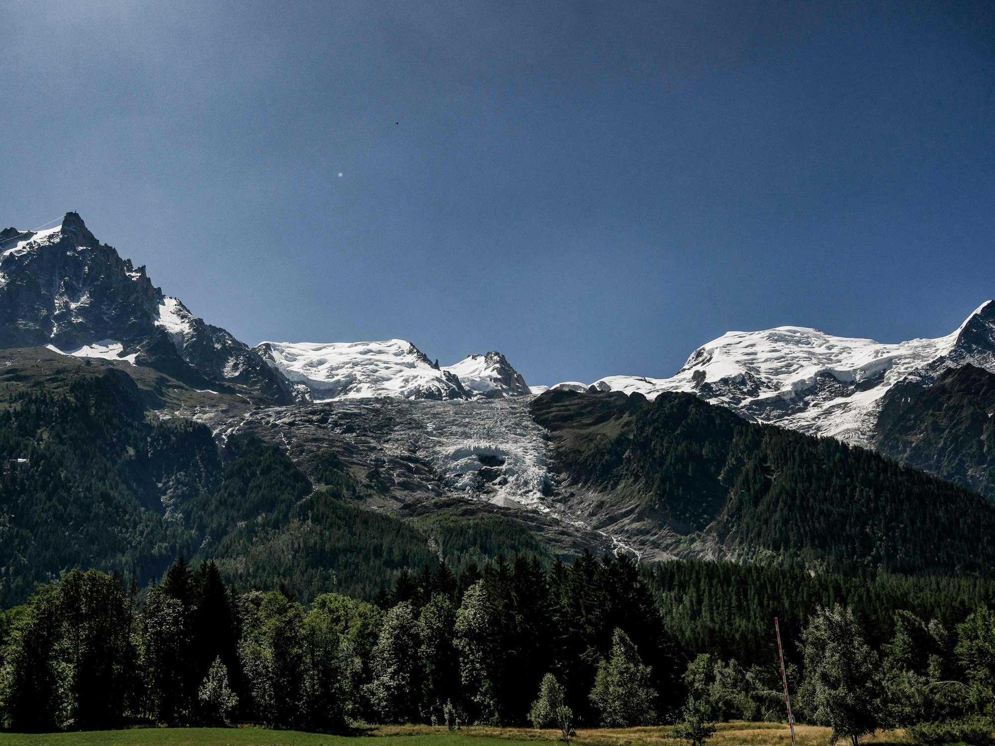 TOPSHOT - This photograph shows a view of a hole that appeared on the Bossons glacier in Chamonix-Mont-Blanc, on July 11, 2025. (Photo by JEFF PACHOUD / AFP)